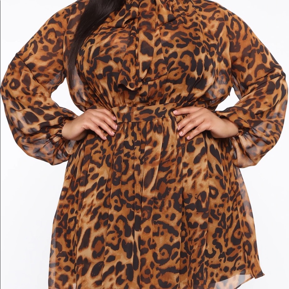 Tie Neck Front
Side Hidden Zipper
100% Polyester